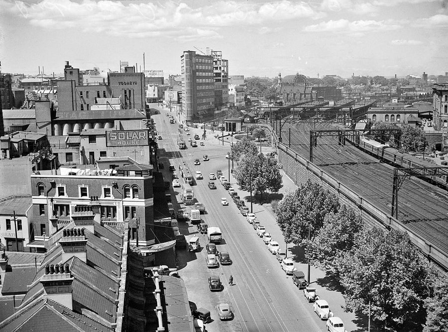 Traffic and railway tracks near Central station, Sydney — photograph, from Haymarket, 1949