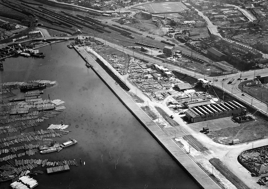 Hume Steel works and timber ponds at Rozelle Bay, aerial view — photograph, from Rozelle Bay, 1930s