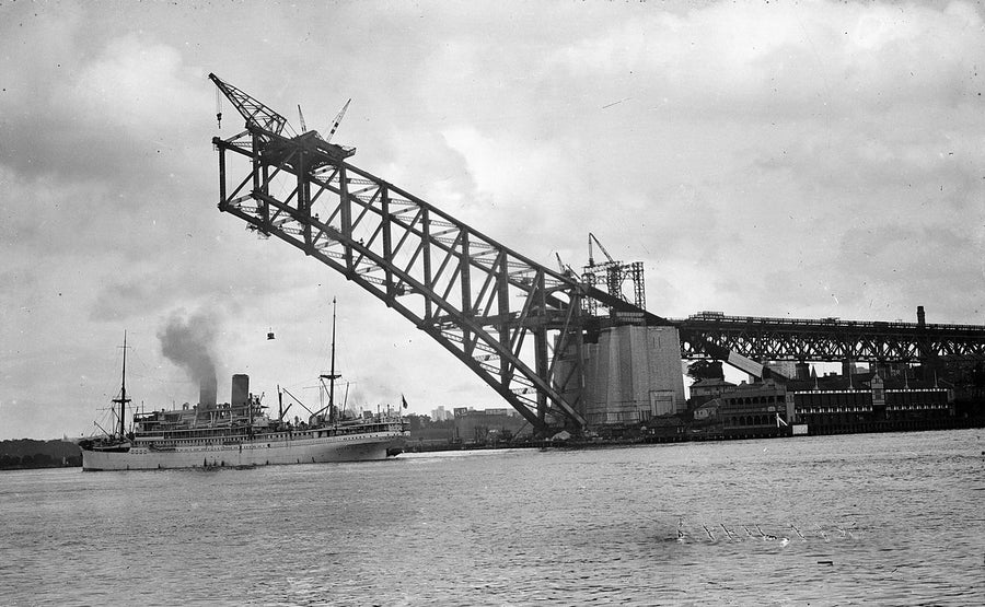 Sydney Harbour Bridge before the arch halves met — photograph, from Sydney Harbour Bridge, 1930