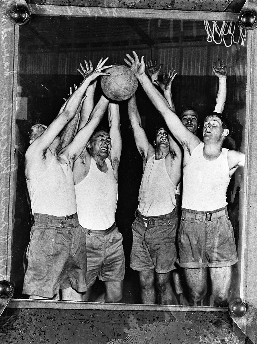 Army recruits contest a basketball, Marrickville depot — photograph, from Marrickville, 1948