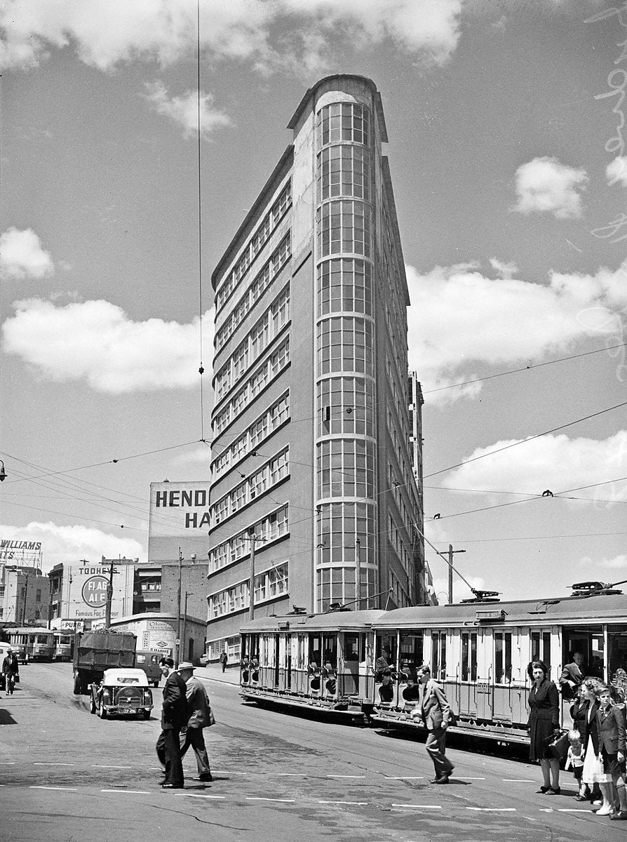 Dental Hospital tower on Chalmers Street, trams passing below — photograph, from Sydney Dental Hospital, 1949