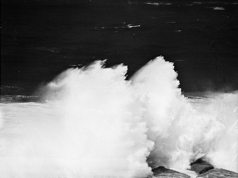 Surf breaking on rocks at Bondi — photograph, from Bondi Beach, 1940
