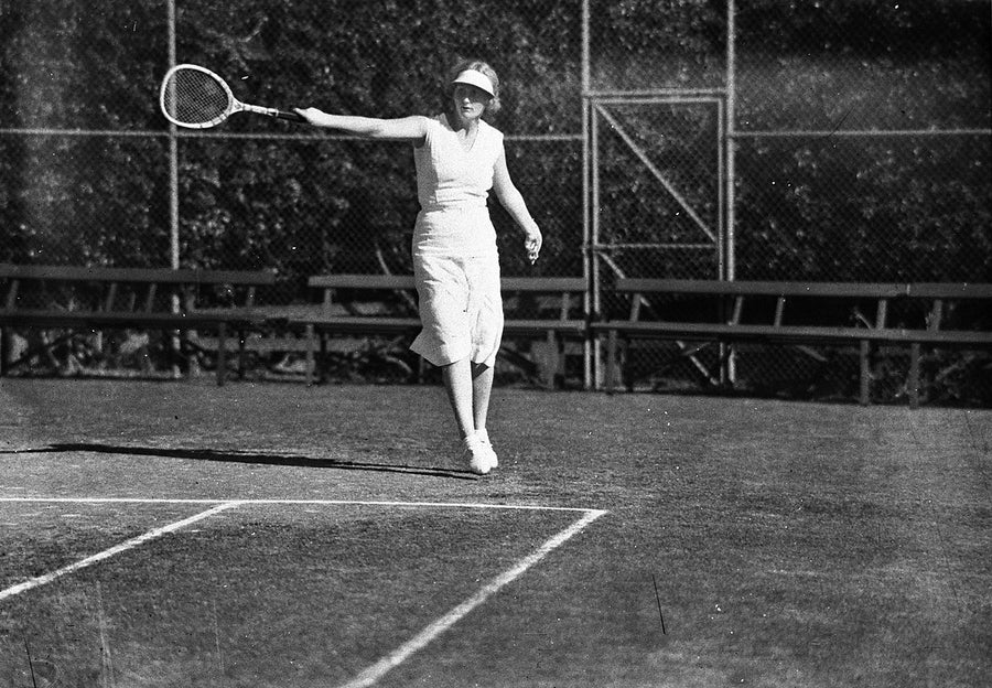 Woman tennis player mid-stroke, Sydney — photograph, from Sydney Cricket Ground, 1934