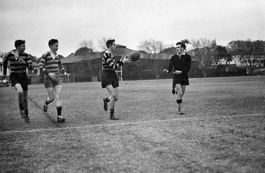 Schoolboy rugby players passing the ball, Sydney Grammar — photograph, from Sydney Grammar School, 1954