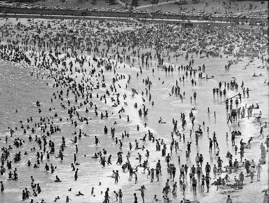 Summer crowds packing a Sydney surf beach — photograph, from Sydney, 1950