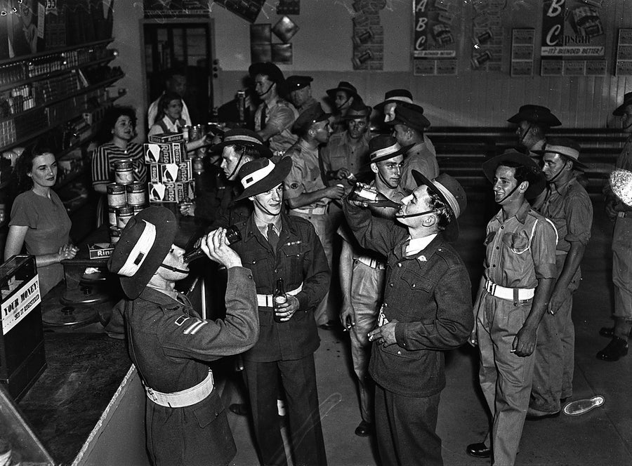Army recruits at a store counter, Marrickville — photograph, from Marrickville, 1948
