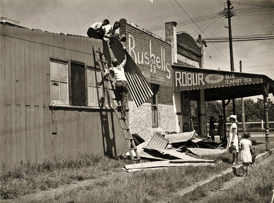 Re-roofing a shop, Botany Road and Rawson Street, Mascot — photograph, from Mascot, c. 1935