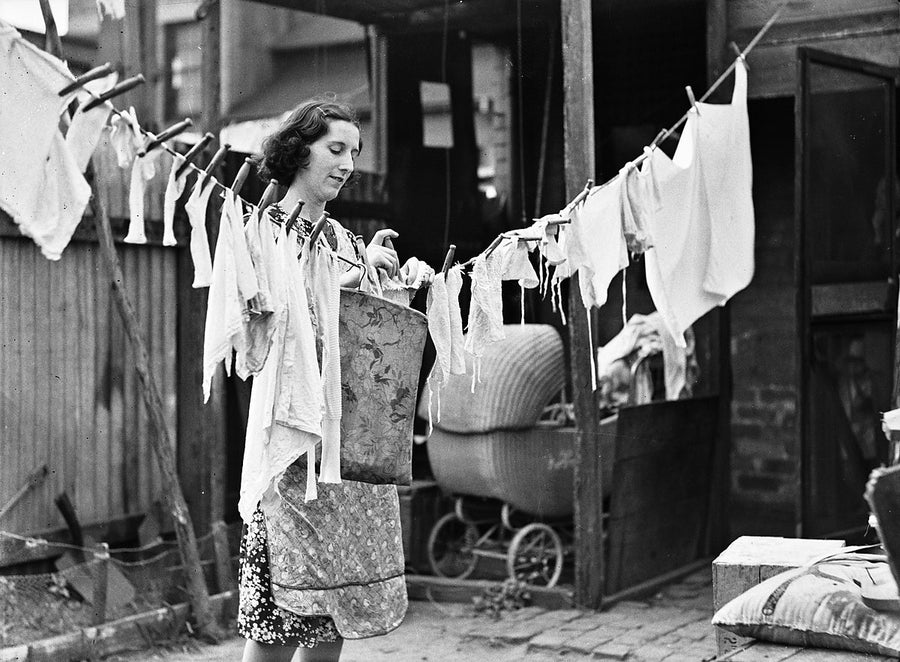 Woman with washing on the line, Erskineville backyard — photograph, from Erskineville, 1938