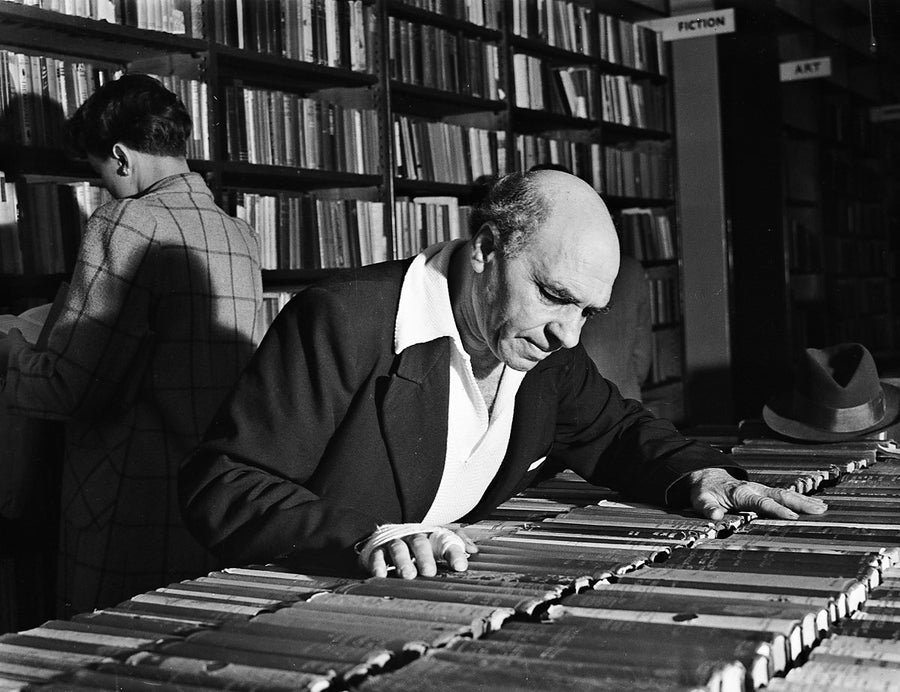 Browsing the second-hand book tables, Marrickville — photograph, from Marrickville, 1949