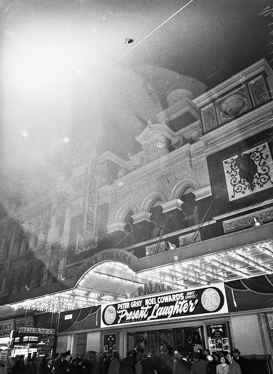 Palace Theatre at night, marquee billing 'Present Laughter' — photograph, from Sydney CBD, 1949