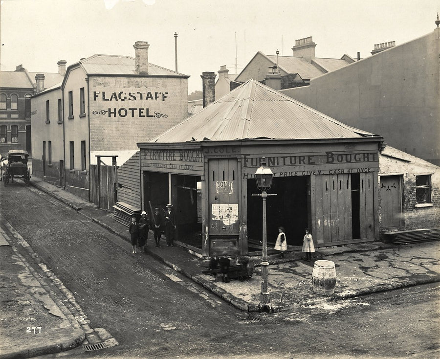 Flagstaff Hotel and 'Furniture Bought' shopfront, The Rocks — photograph, from The Rocks, 1900