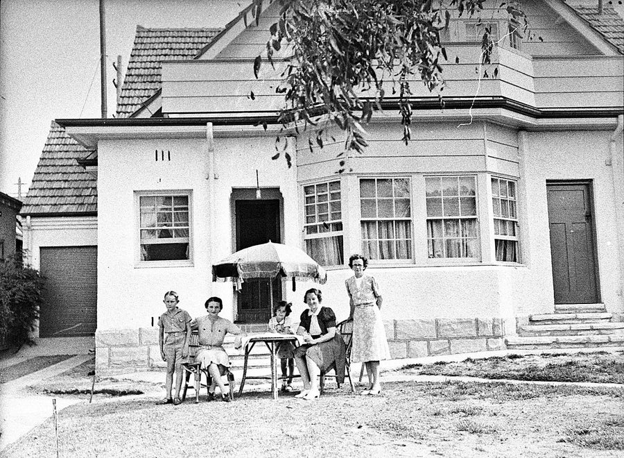 Family outside a bay-windowed home, North Sydney — photograph, from North Sydney, 1940