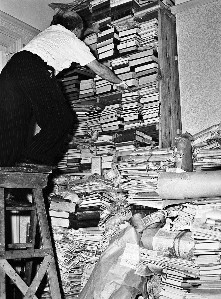Book collector on a stepladder, Marrickville — photograph, from Marrickville, 1949