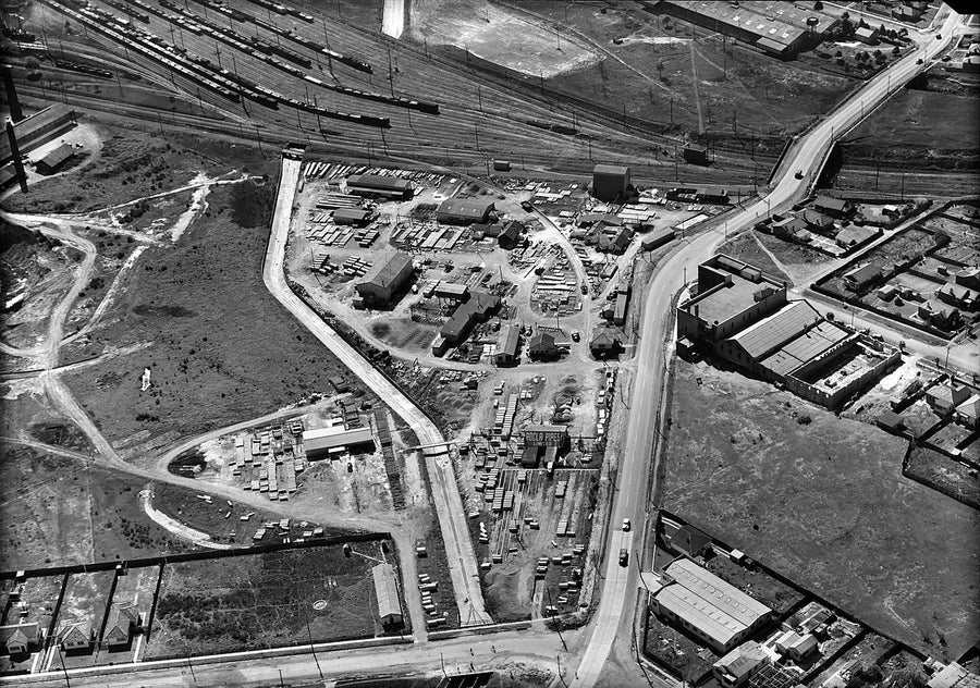 Rocla Pipes works and railway sidings, aerial view — photograph, c. 1950