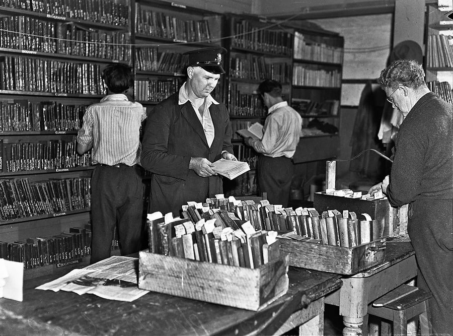 Book sorting inside the library at Parramatta Gaol — photograph, from Parramatta Gaol, 1950
