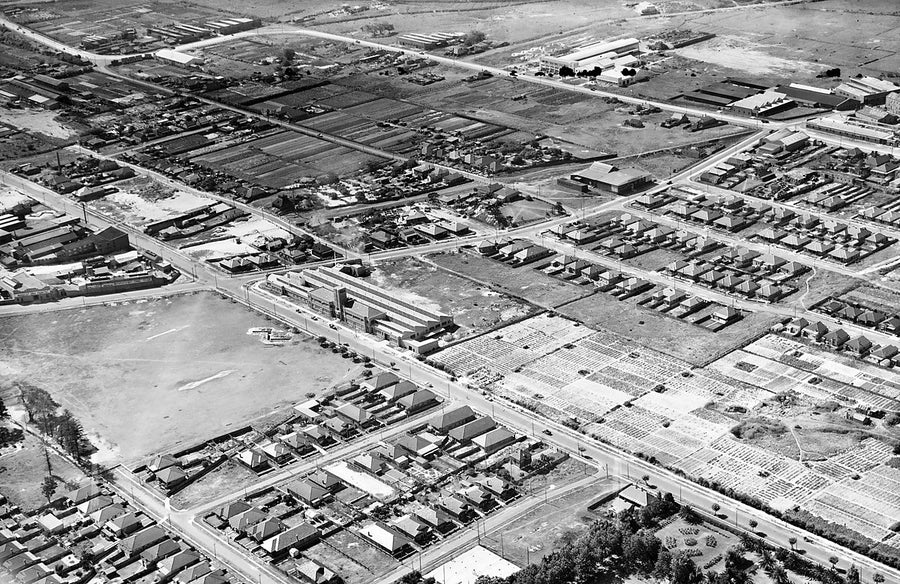 Aerial view over market gardens, factories and housing, Mascot — photograph, from Mascot, 1940s