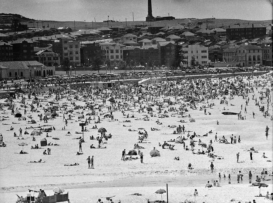 Crowds on Bondi Beach below the promenade — photograph, from Sydney, 1950