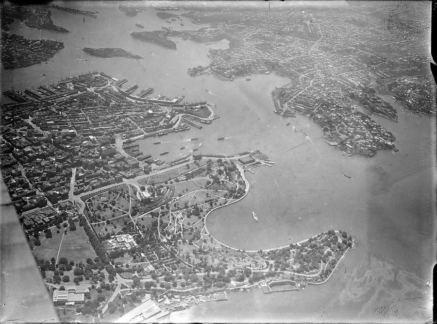 Sydney Harbour and the city from the air, before the Harbour Bridge — photograph, from Royal Botanic Garden, c. 1920–38