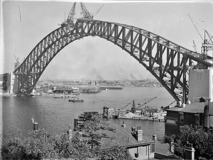 Sydney Harbour Bridge arch nearing completion — photograph, from Milsons Point, 1930