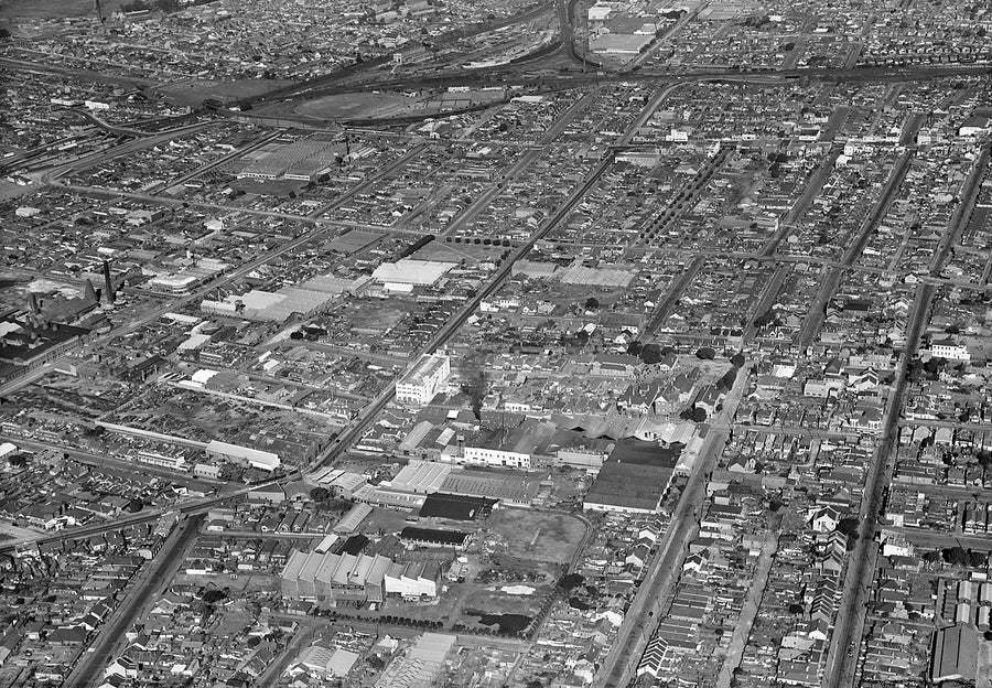 Marrickville from the air: terrace grid, factories and rail lines — photograph, from Marrickville, after 1935
