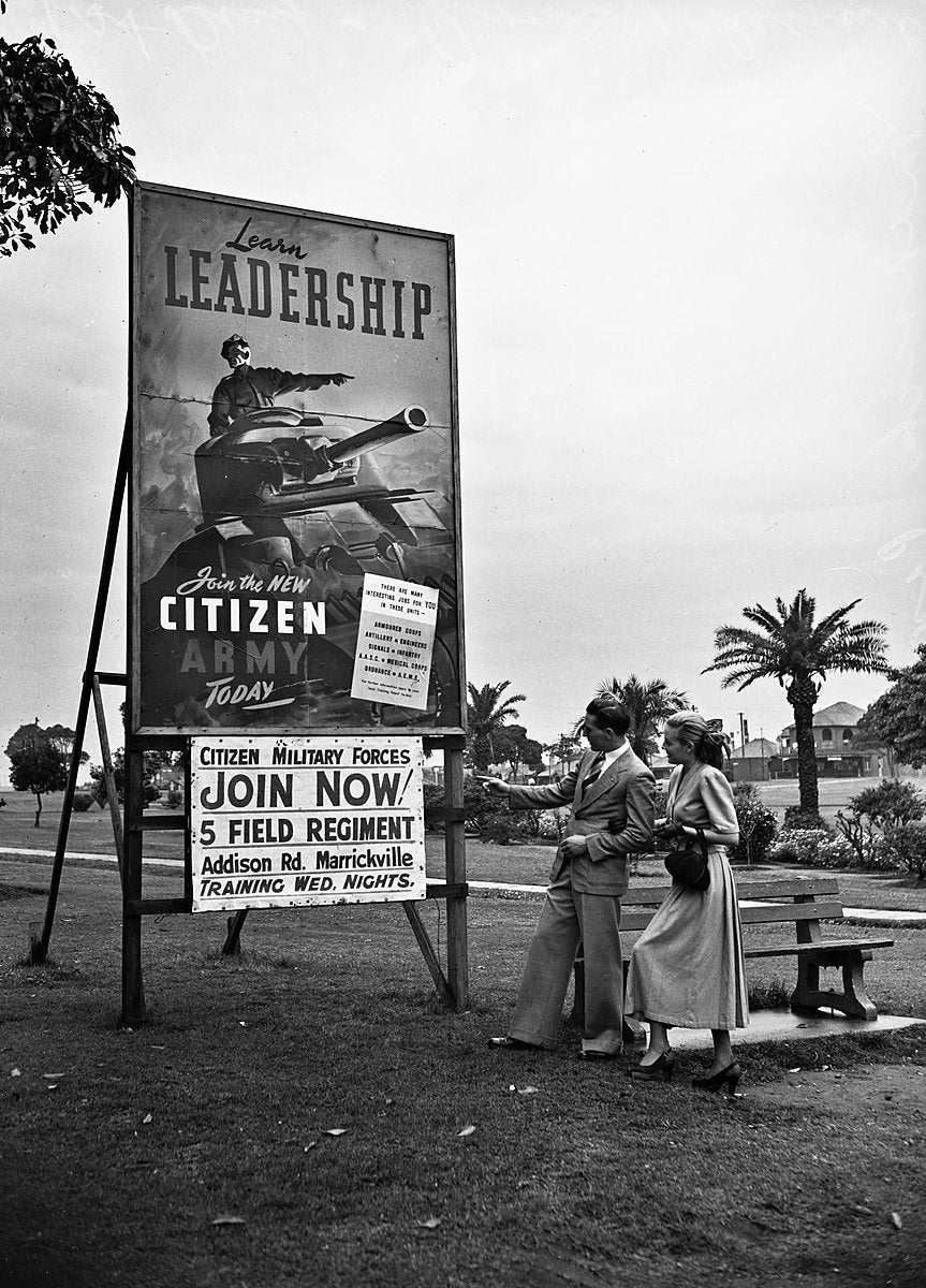 Citizen Military Forces recruiting billboard, Addison Road, Marrickville — photograph, from Addison Road, 1948