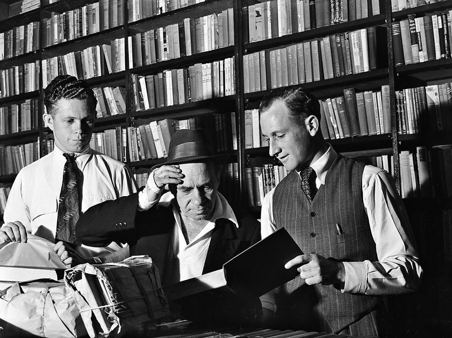 Sorting books at a Marrickville book collection — photograph, from Marrickville, 1949
