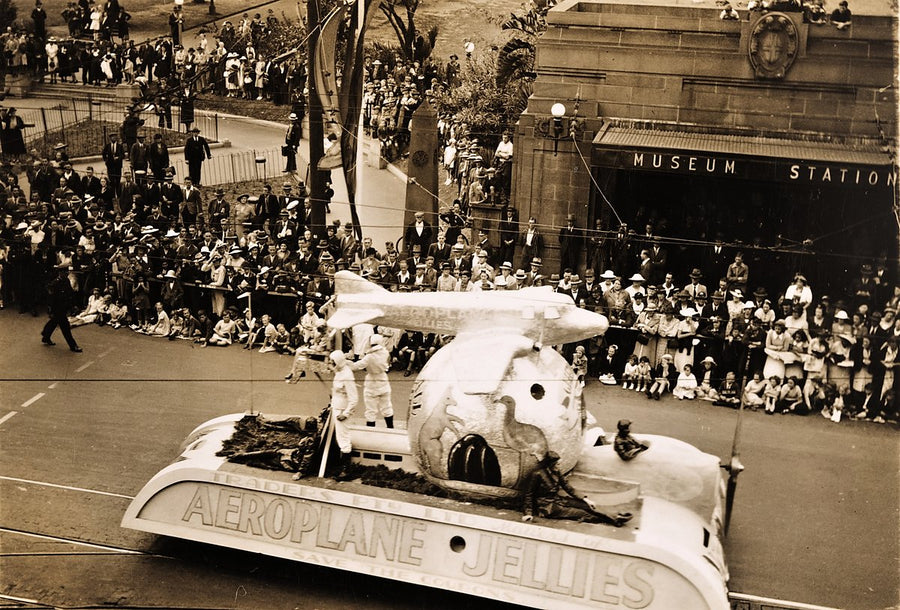 Aeroplane Jellies float passing Museum Station — photograph, from Sydney CBD, 1938