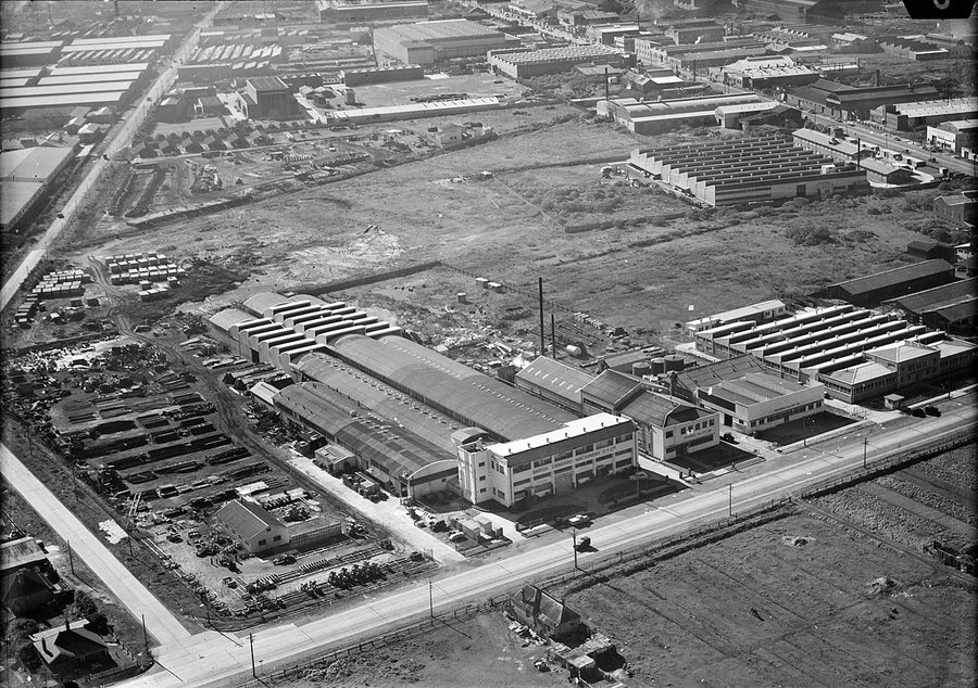 Sawtooth-roofed workshops and rail sidings, Waterloo — photograph, from Waterloo, 1930–50