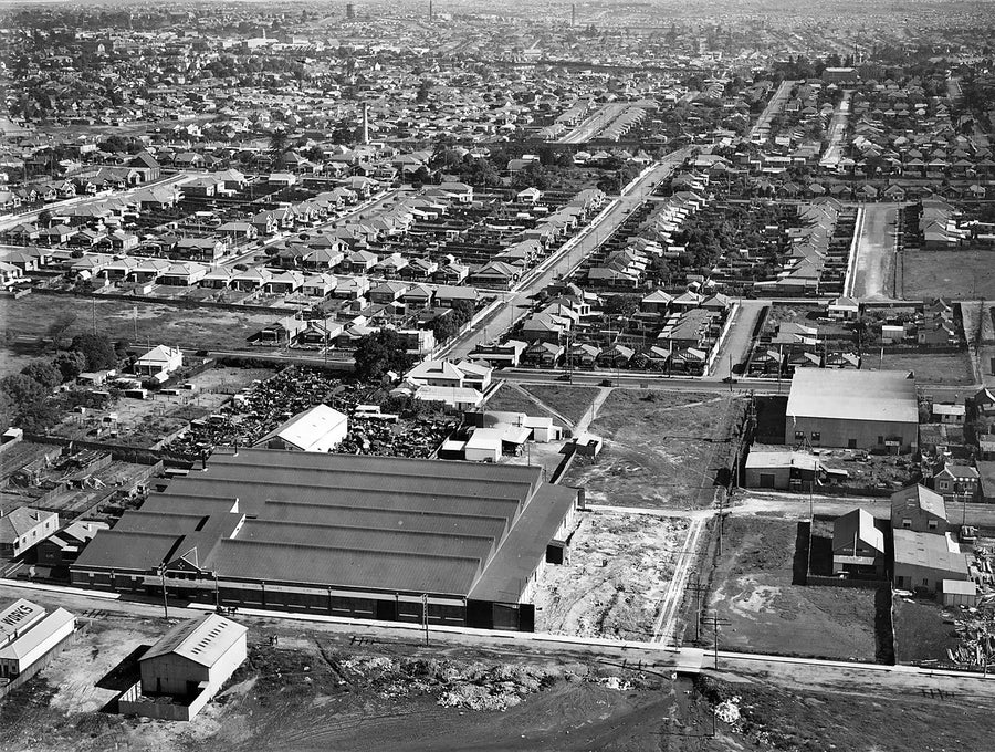 Richard Hughes can works, Queens Road, Five Dock, from the air — photograph, from Queens Road, 1930s