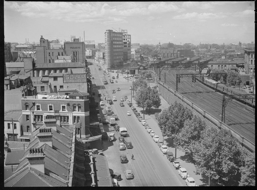 Traffic and railway tracks near Central station, Sydney, 1949 — photograph, from Central railway station vicinity, Sydney, circa 1949