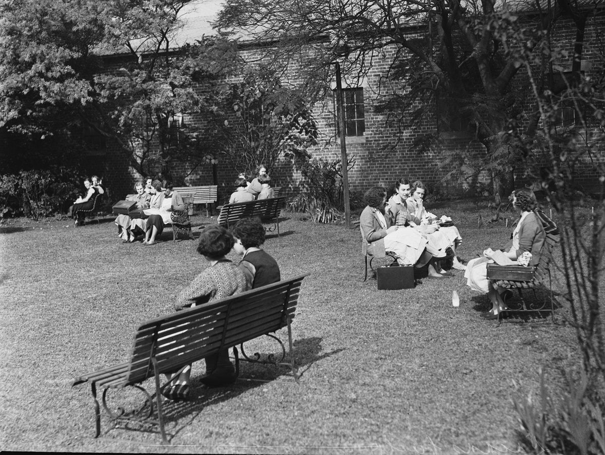Lunch break on the lawn, Vicars Woollen Mills, Marrickville, 1936 — photograph, from Marrickville, circa 1936