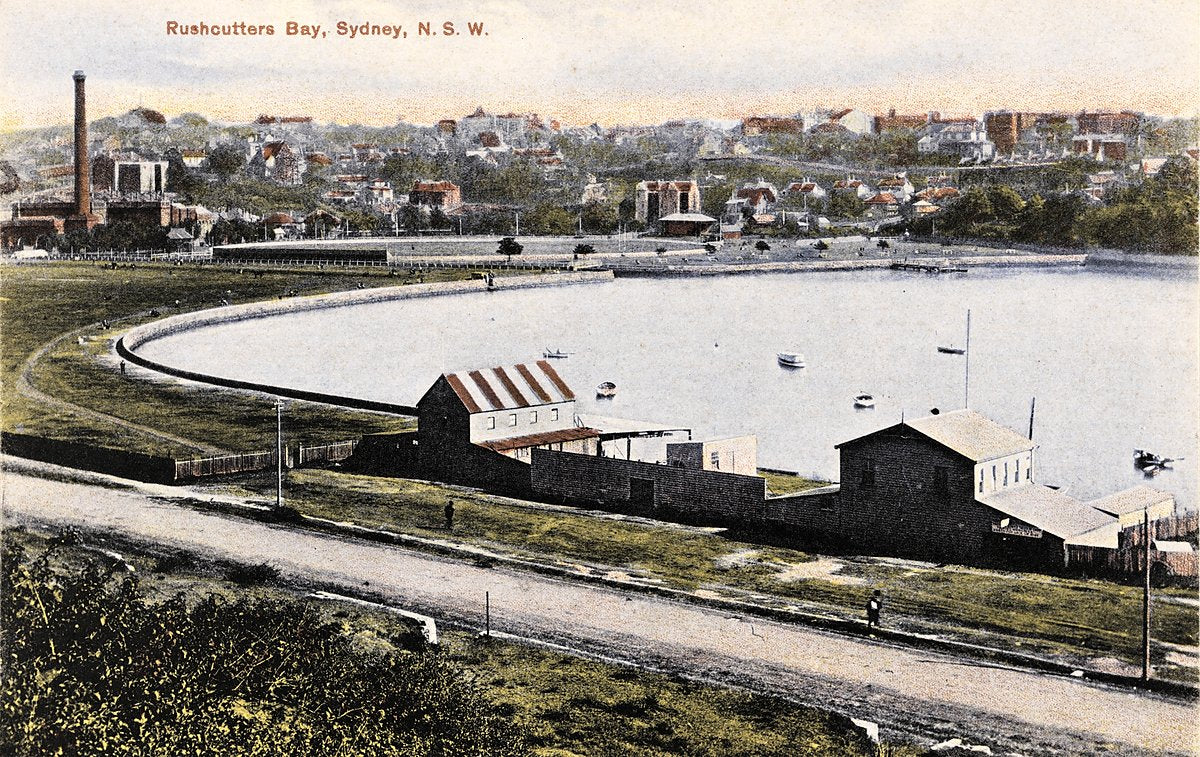 Rushcutters Bay seawall and boat sheds, Sydney — photograph, from Rushcutters Bay, c. 1910–15