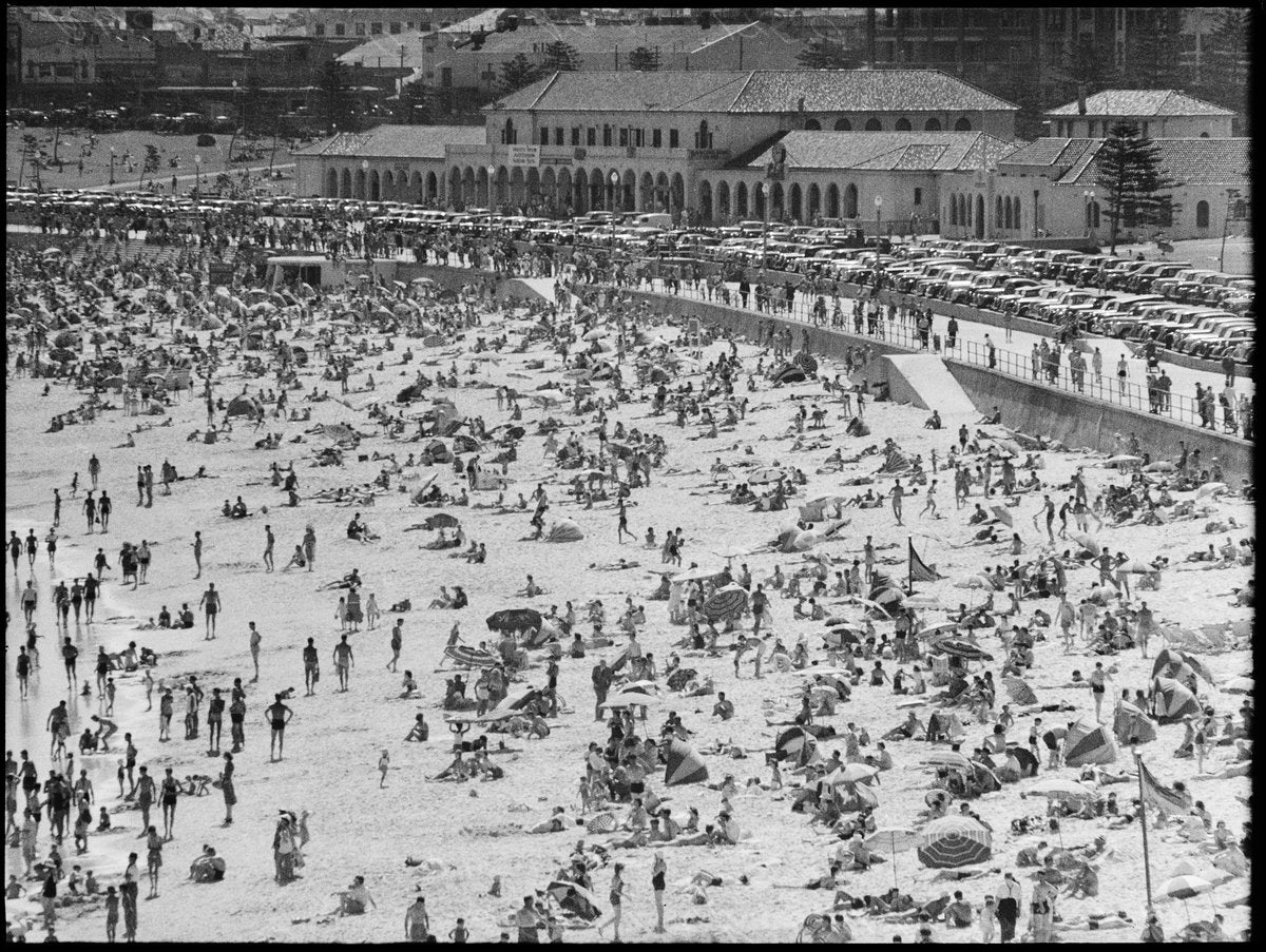 Crowds at Bondi Beach below the Pavilion — photograph, from Bondi Beach and Bondi Pavilion, Bondi Beach, NSW, circa 1950