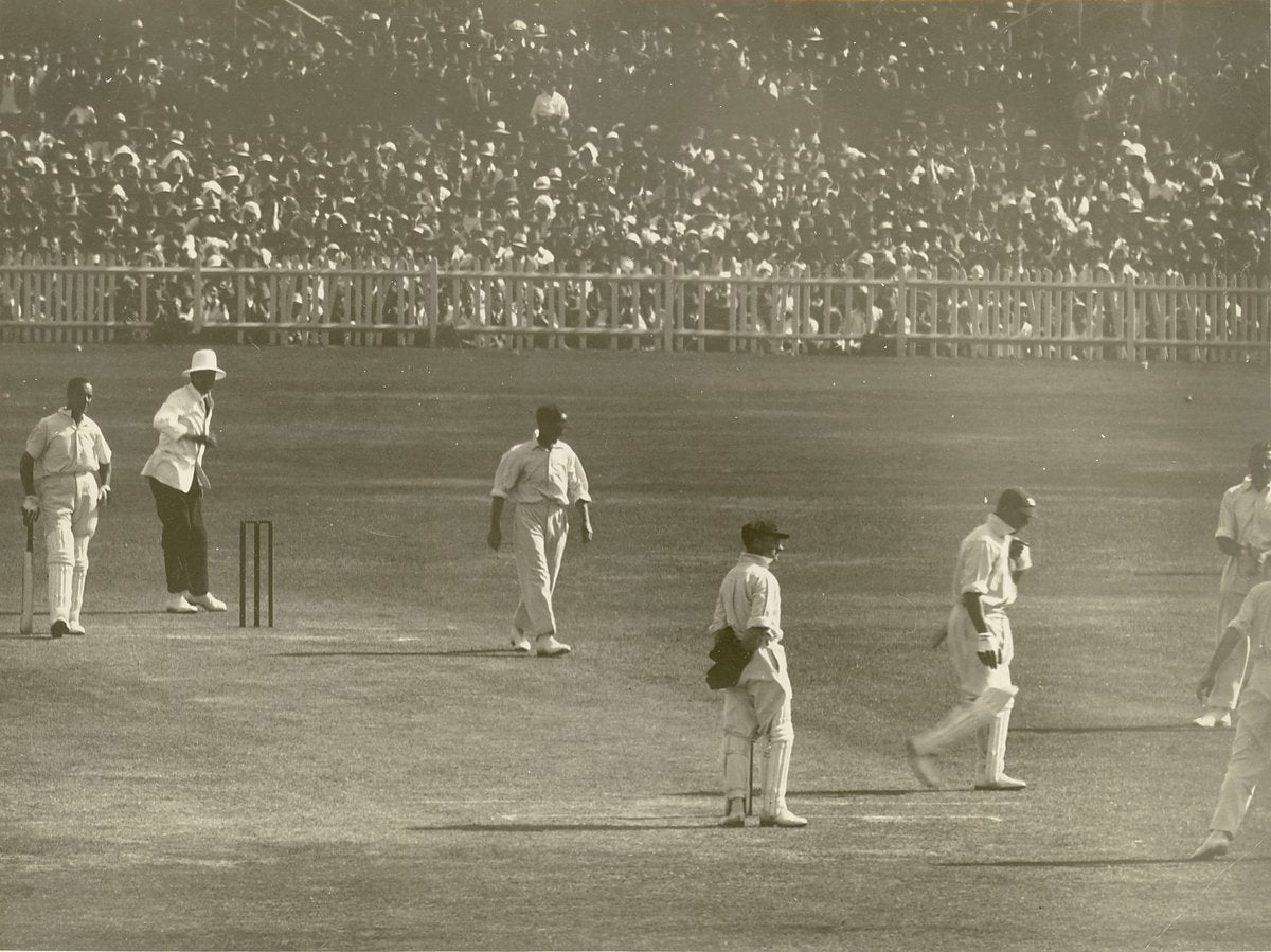 Cricket match in progress before a crowded grandstand, Sydney — photograph, circa 1937