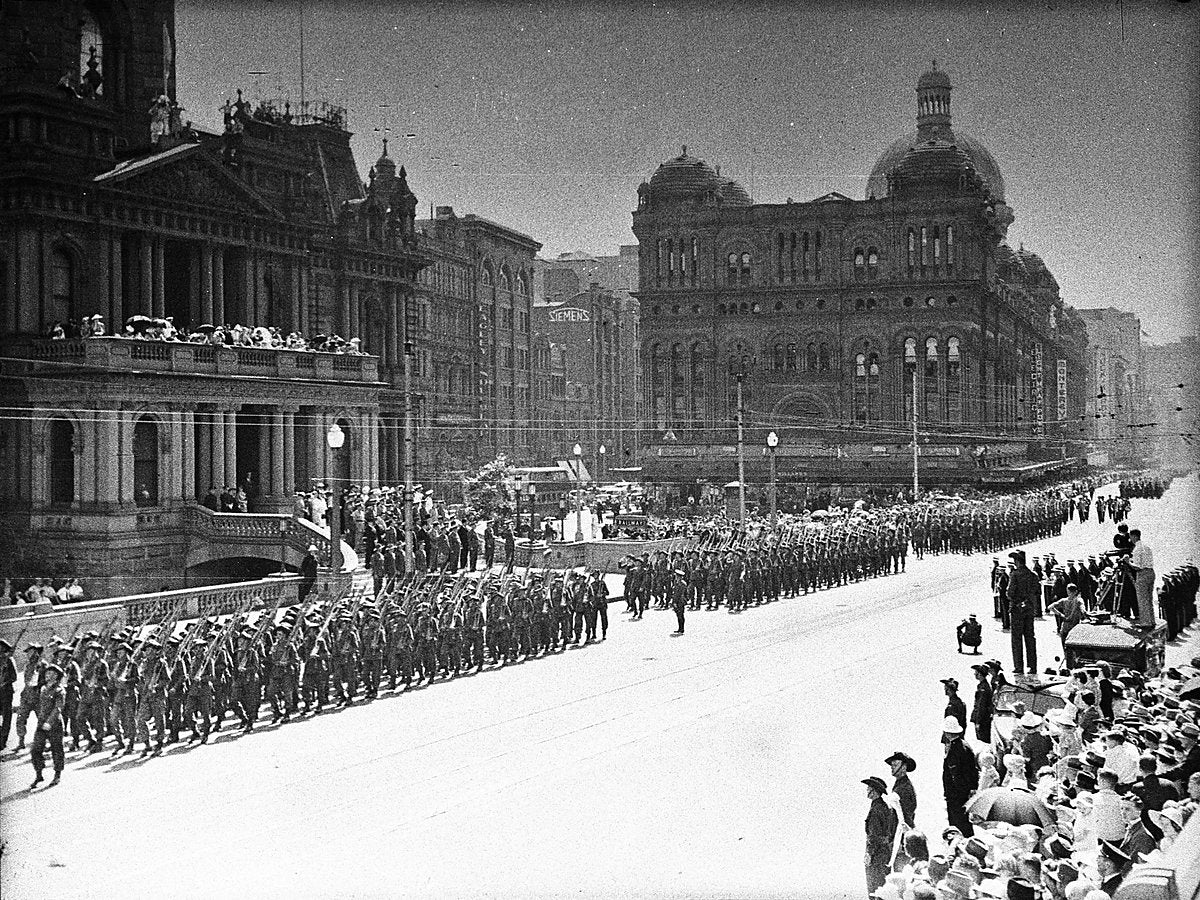 2nd AIF marching past the saluting base at Sydney Town Hall, George Street, 1940 — photograph, from Sydney Town Hall, circa 1940