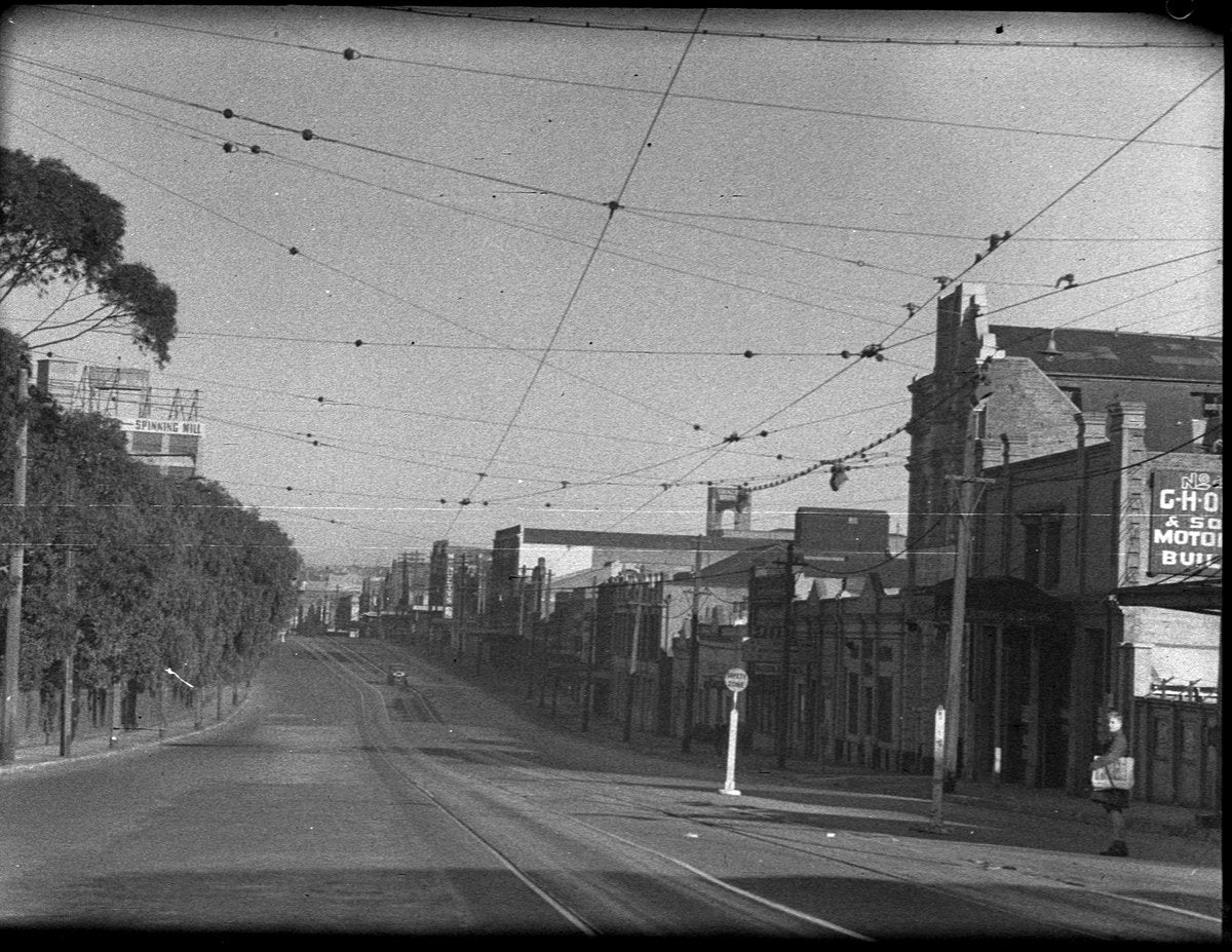 Parramatta Road at Camperdown, tram tracks and empty roadway — photograph, from Parramatta Road, Camperdown, NSW, circa 1946