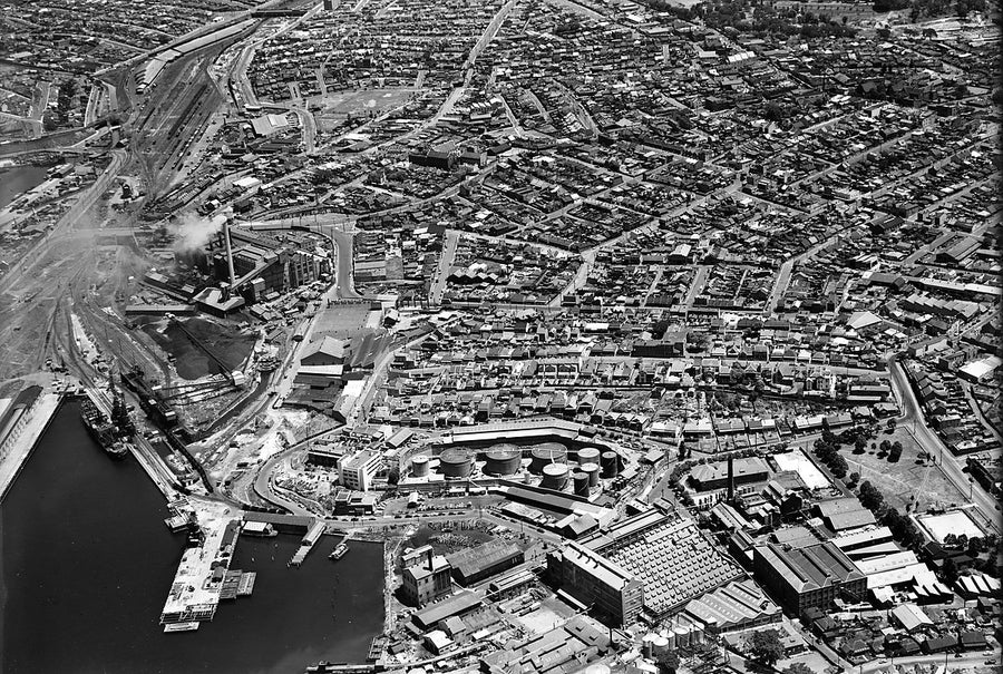 Ampol terminal and Balmain waterfront from the air — photograph, from Balmain, c. 1950