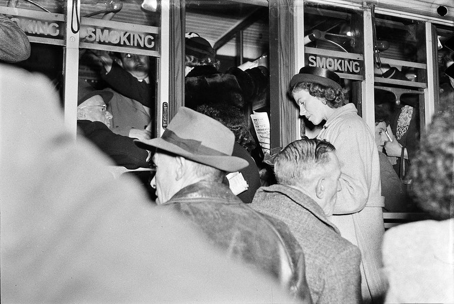 Smoking compartments packed at peak hour on a Sydney tram, 29 June 1949 — photograph, from Sydney CBD, circa 1949