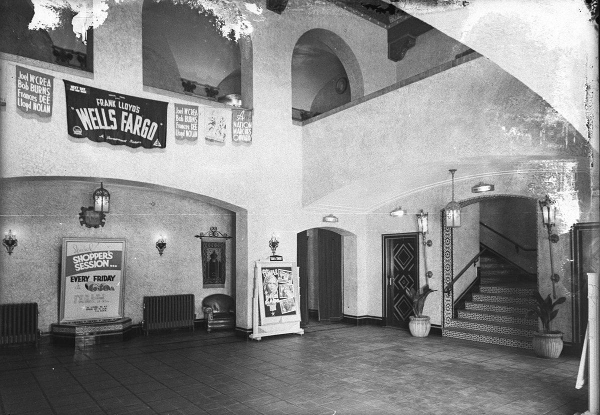 Vestibule of the Roxy Theatre, Parramatta, with "Wells Fargo" banners — photograph, from The Roxy Theatre, circa 1942