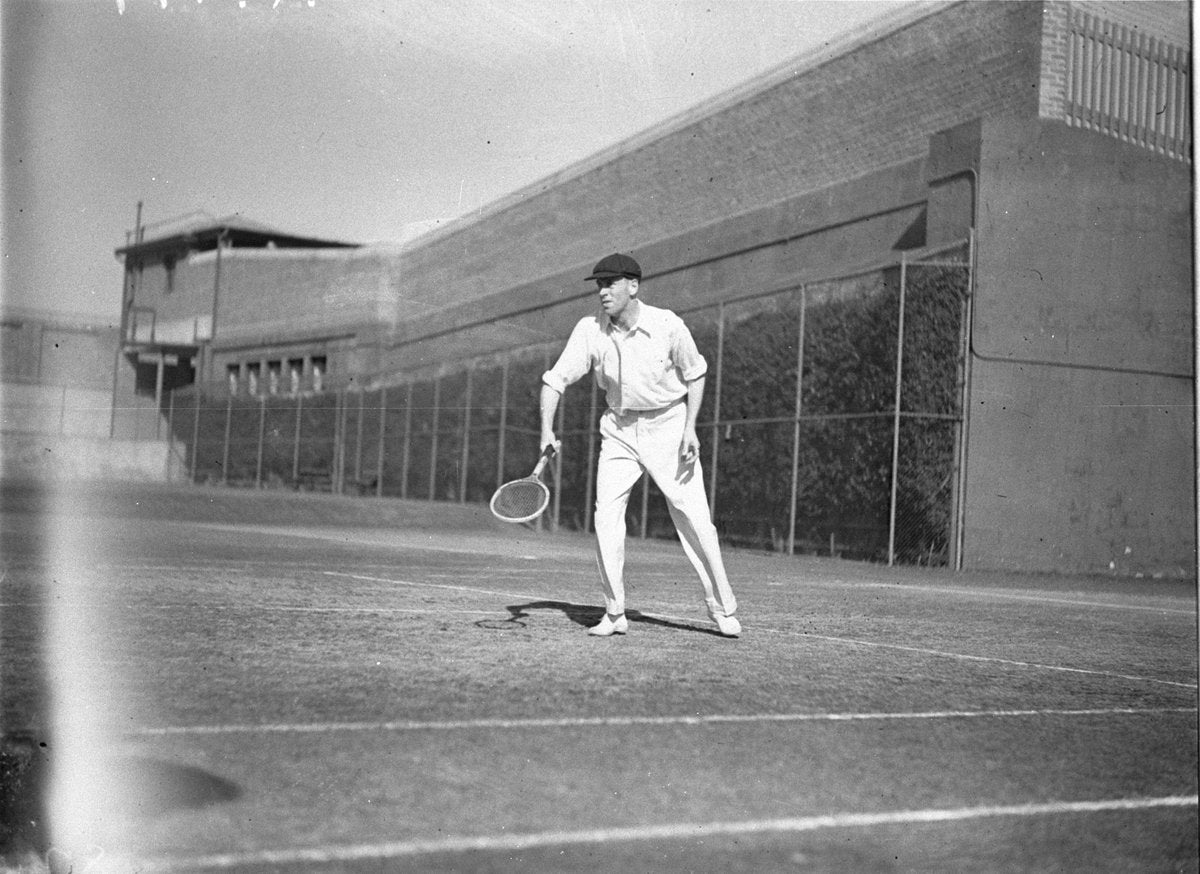 Tennis player in ready position, Sydney Cricket Ground, 1934 — photograph, from Sydney Cricket Ground, Moore Park, Sydney, circa 1934