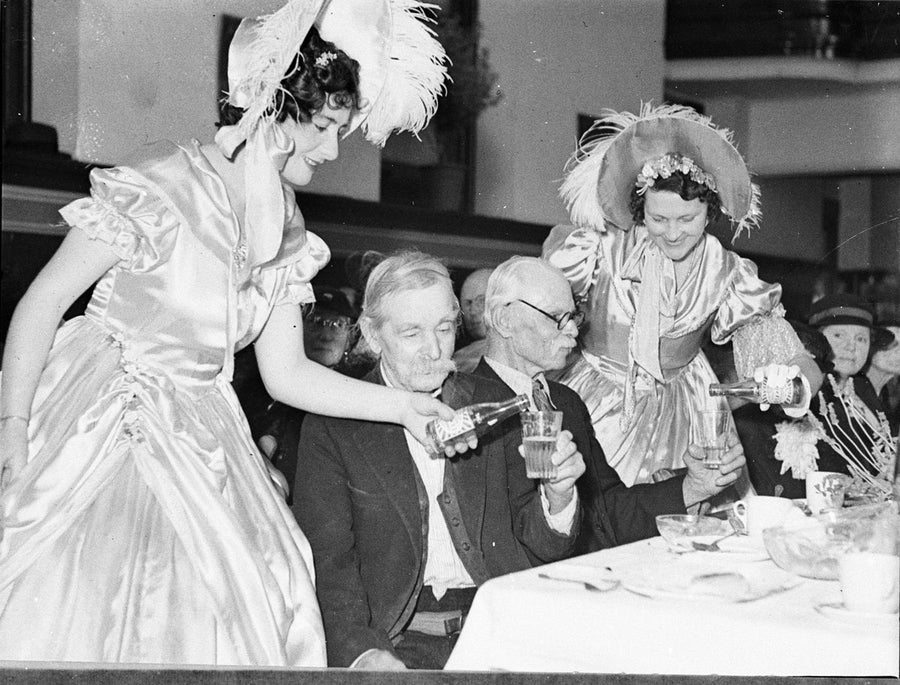 Costumed hostesses pouring drinks at a Parramatta Sesquicentenary gathering, 1938 — photograph, from Parramatta, circa 1938