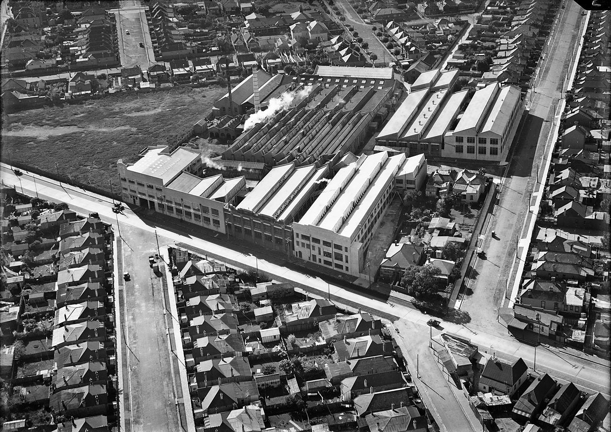 Aerial view of a sawtooth-roofed factory complex, Marrickville — photograph, from Marrickville, 1935–45