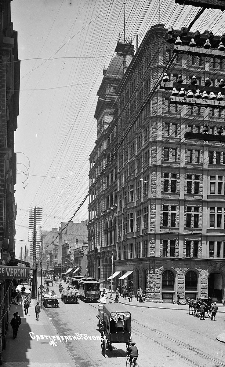 Trams and horse-drawn traffic on Castlereagh Street near Martin Place, Sydney — photograph, from Martin Place, circa 1900