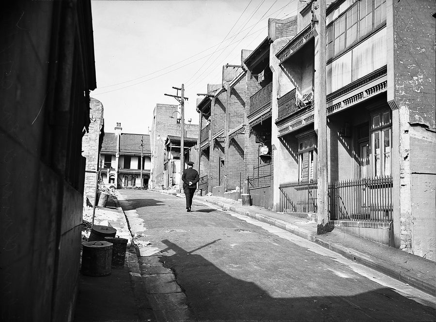 Terrace houses on a Surry Hills street, April 1950 — photograph, from Surry Hills, circa 1950