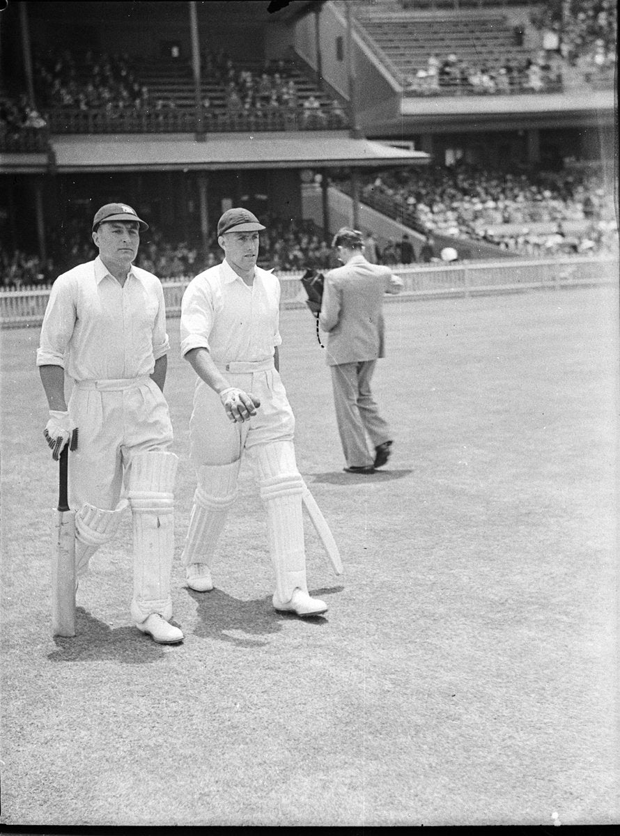 Two MCC batsmen walking out, Second Test, Sydney Cricket Ground — photograph, from Sydney Cricket Ground, Moore Park, Sydney, circa 1936