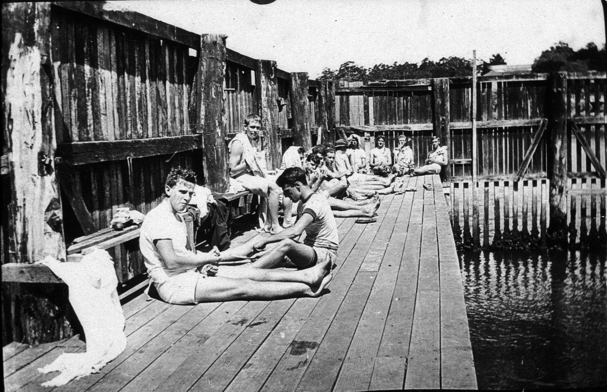 St Ignatius' Baths, Riverview — bathers on the timber decking — photograph, from St Ignatius' College, Riverview, New South Wales