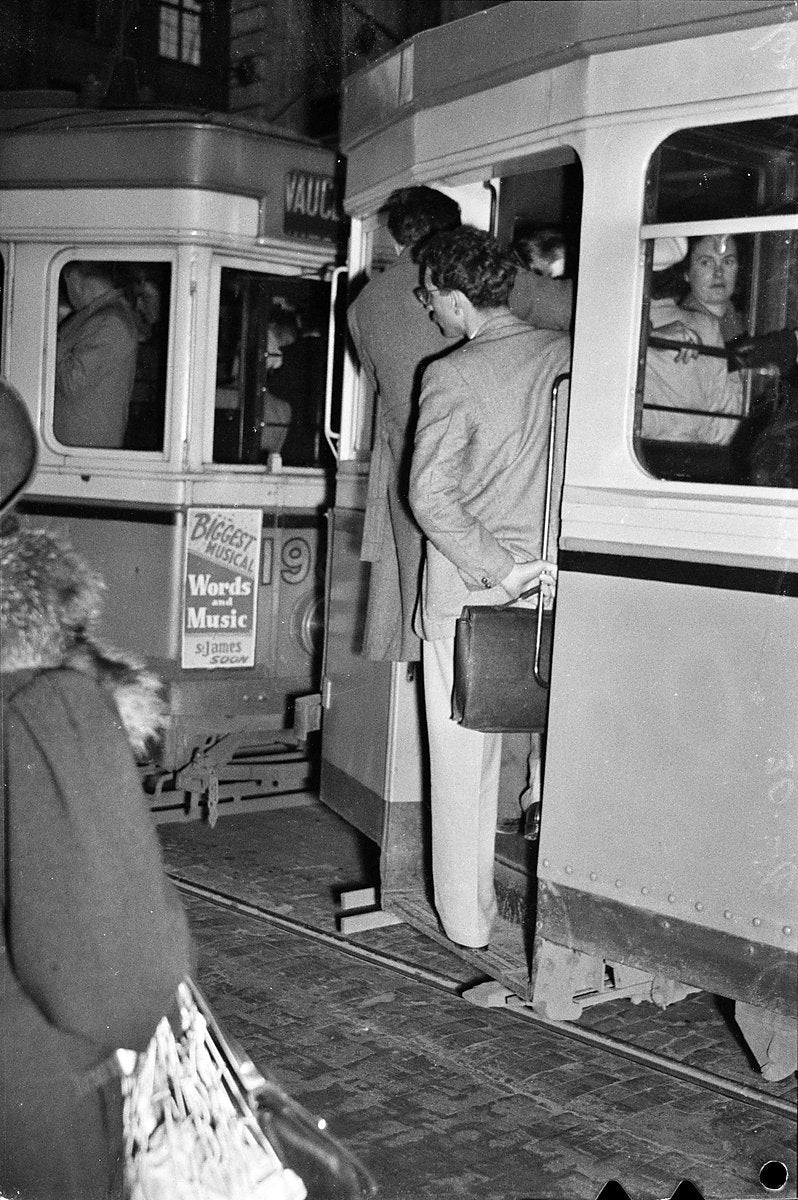 Crowded trams at night, Sydney, 1949 — photograph, from Sydney CBD, circa 1949