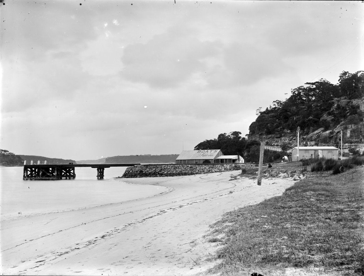 Timber jetty and boat-hire shed on a Sydney beach — photograph, circa 1890