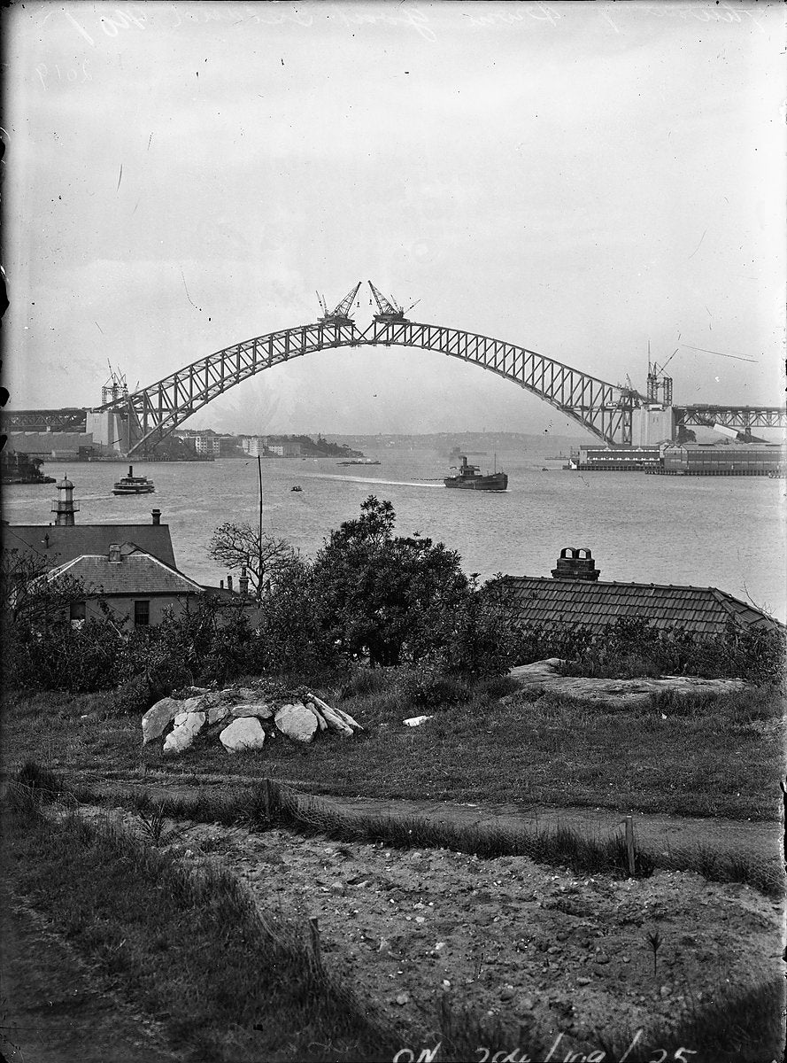 Sydney Harbour Bridge arch almost complete, seen from the North Shore — photograph, from Sydney Harbour Bridge, circa 1931