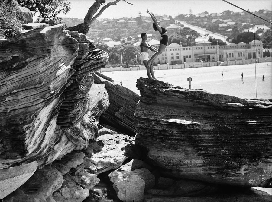 Beach gymnasts on the sandstone, Balmoral Beach — photograph, from Balmoral Beach, circa 1940
